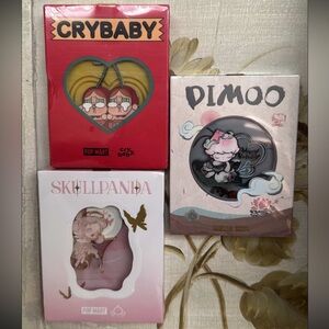 NWT POPMART BADGES FT. CRYBABY, DIMOO AND SKULLPANDA !!